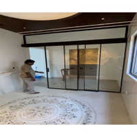 Telescopic Sliding Wall With Fluted Glass