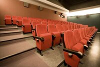 Auditorium Push Back Chairs - Upholstered In Luxurious Fabric , Ergonomic Design , Sleek Modern Aesthetics With Innovative Reclining Mechanism