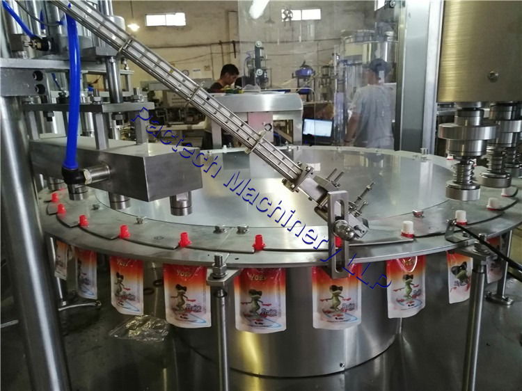 Spout Filling Machine - Automatic Grade: Automatic