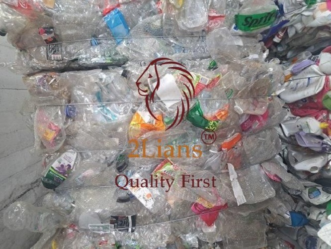 PET bottles in bales contain between thirty-five percent and forty percent trays