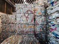 PET bottles in bales contain between thirty-five percent and forty percent trays