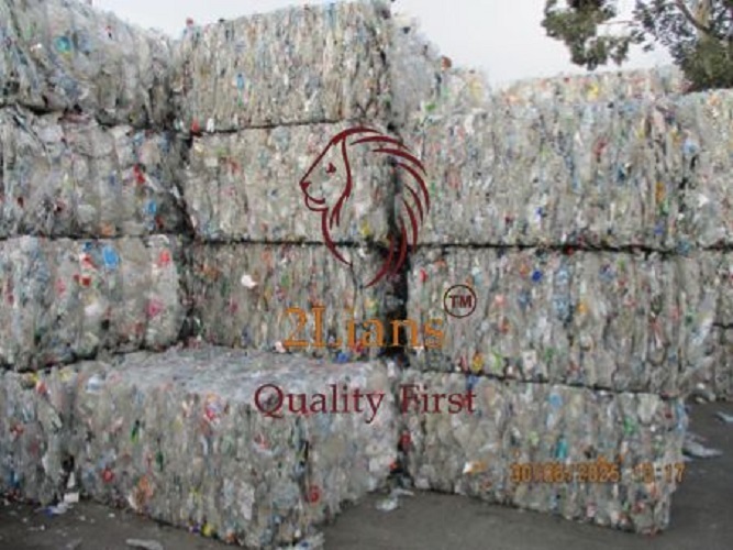 PET bottles in bales contain between thirty-five percent and forty percent trays