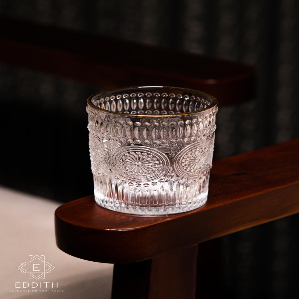 water glass with golden rim