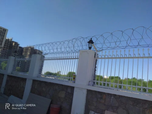 Concertina Wall Fencing Service - Application: Commercial Site