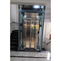 Glass Passenger Lift - 25 Feet Max Height, 415v Ac Drive, 6 Ft Machine Room, 40 Db Noise Level | Intuitive Calling Box, Safety Sensors, Emergency Lowering