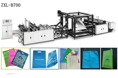 Non Woven Bag Making Machine - Eco-friendly, 220 Volt Electric Drive, Automatic Operation | White Color, 1 Year Warranty