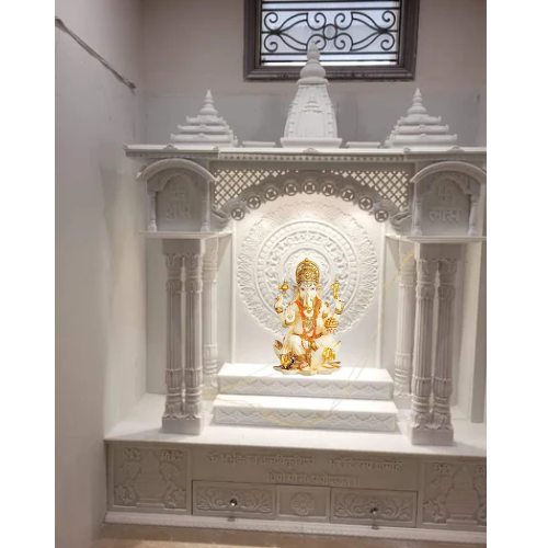 Carved marble mandir with Ganesha statue