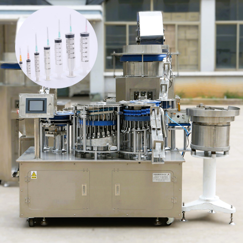 Disposable syringe manufacturing machine