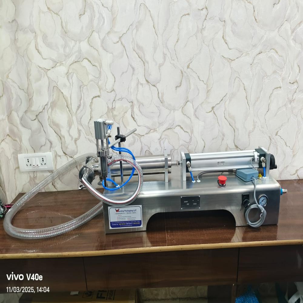 Semi Automatic Liquid Filling Machine - Stainless Steel, 30 Kg, 10-100 Ml Filling Volume , Single Nozzle Design, High Precision, 600 Bottles/hr