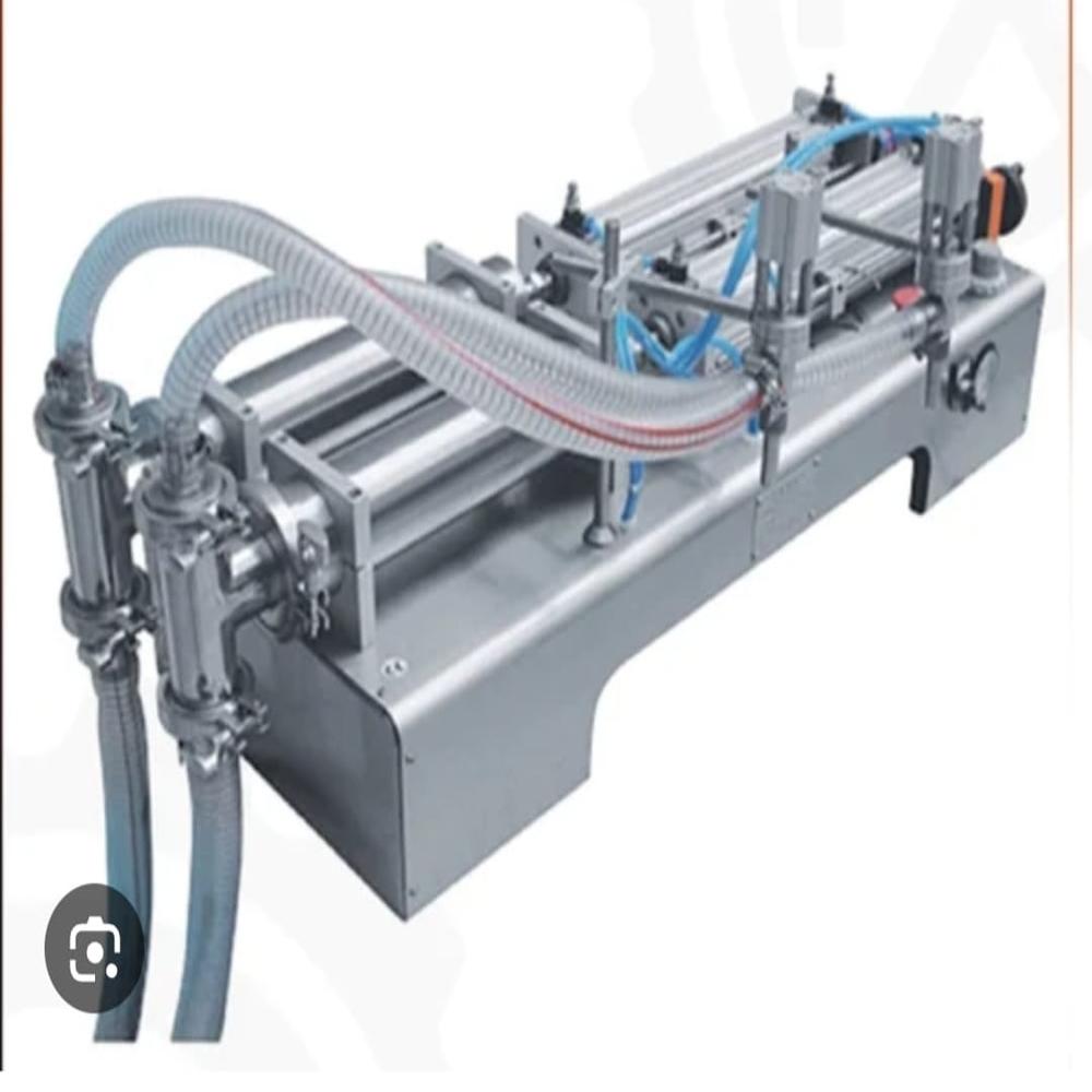 SEMI AUTOMATIC DOUBLE HEAD LIQUID FILLING MACHINE 