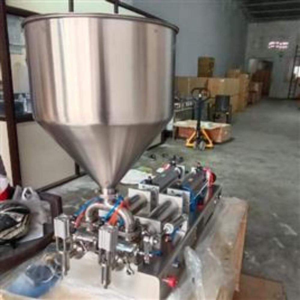 SEMI AUTOMATIC DOUBLE HEAD PASTE FILLING MACHINE 