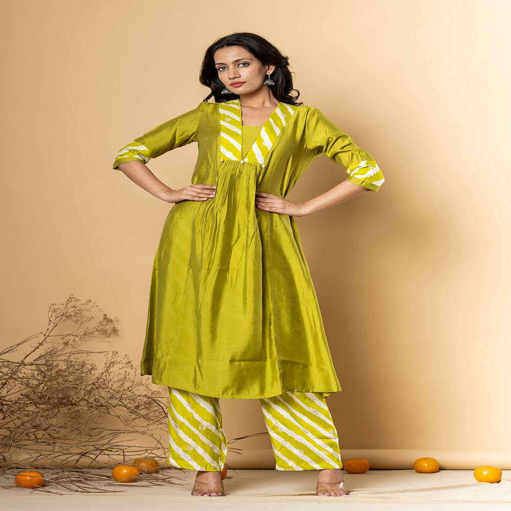 Anarkali Style Muslin Fabric Lime Green Color Kurta And Bottom 