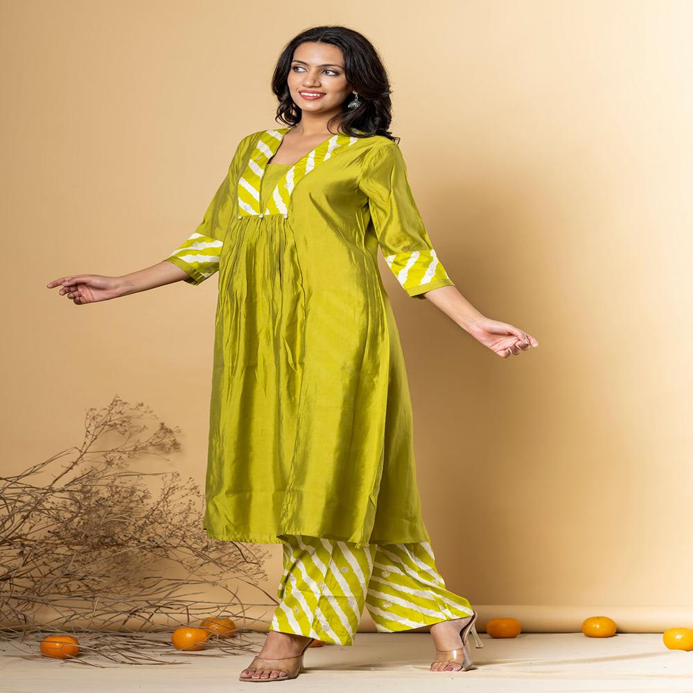 Anarkali Style Muslin Fabric Lime Green Color Kurta And Bottom