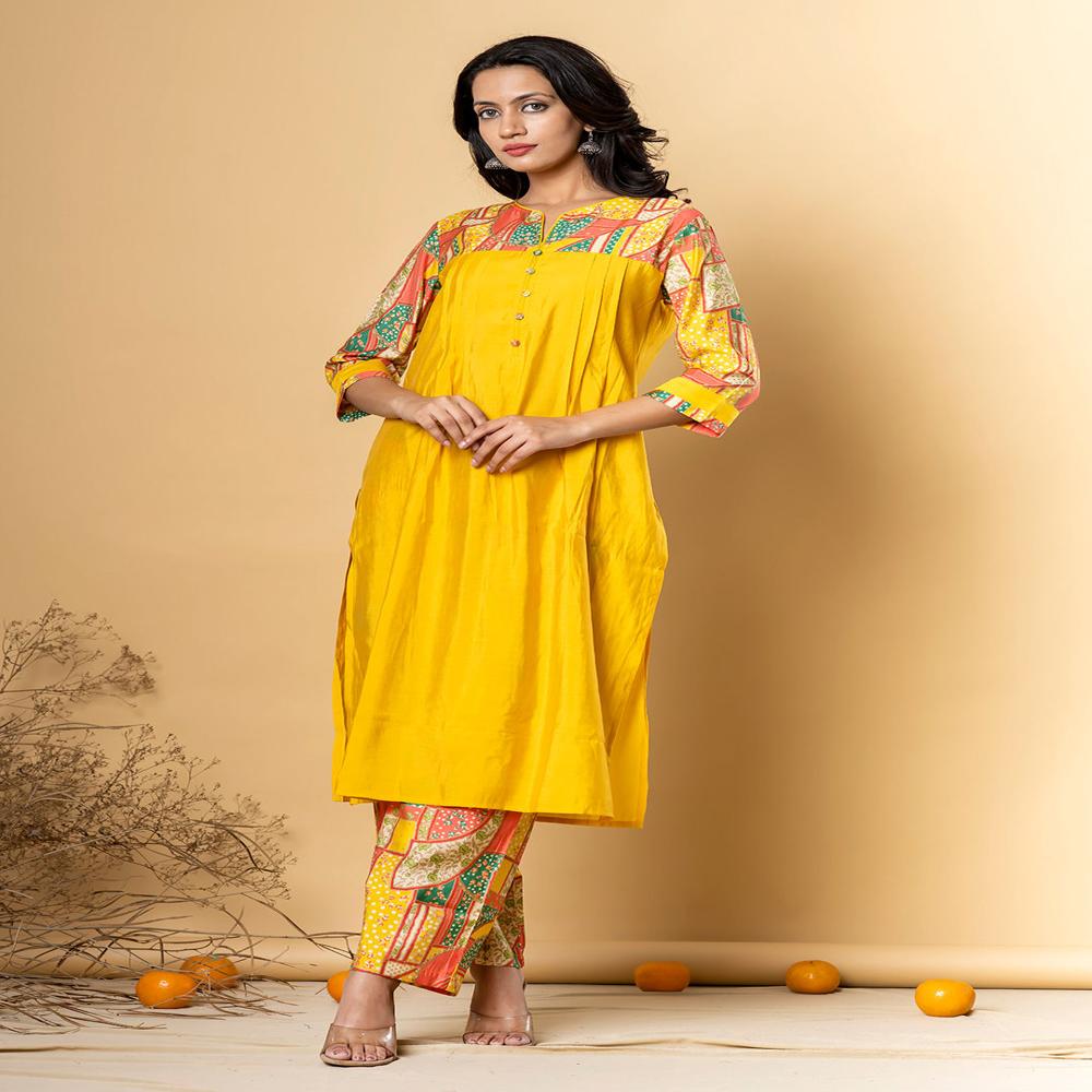 Straight Style Silk Fabric Yellow Color Kurta With Bottom