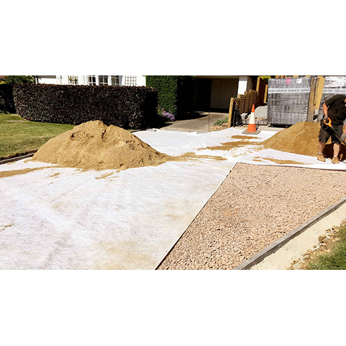White Non Woven Geotextile Membrane Lays On Top Of Gravel