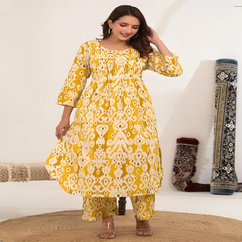 A Line Style Cotton Fabric Yellow Color Kurta And Bottom