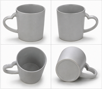Heart Shape Handle Ceramic Coffee Mug - Color: White