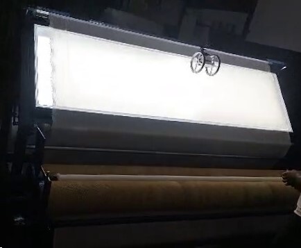 Fabric Inspection with Rolling Machine in Full Glass