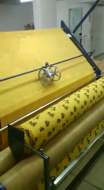 Fabric Inspection With Rolling Machine In Wooden Board - Color: Multiple