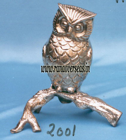Silver Brass Metal Owl Sitting On Brass Leaves