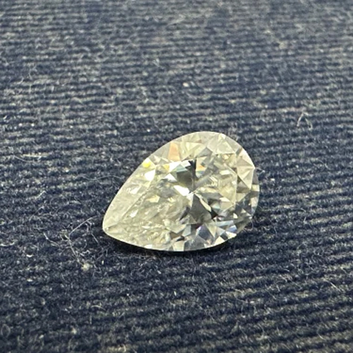 Moissanite Pear 7X10Mm - Diamond Cut: Very Good