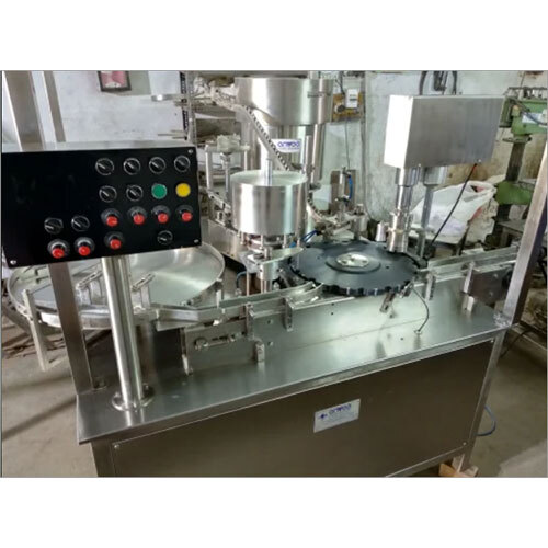 आई ड्रॉप भरने की मशीन