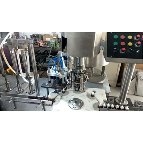 Automatic 4 Head Vial Filling And Spray Pump Placing And Sealing Machine - Accuracy: 100 %