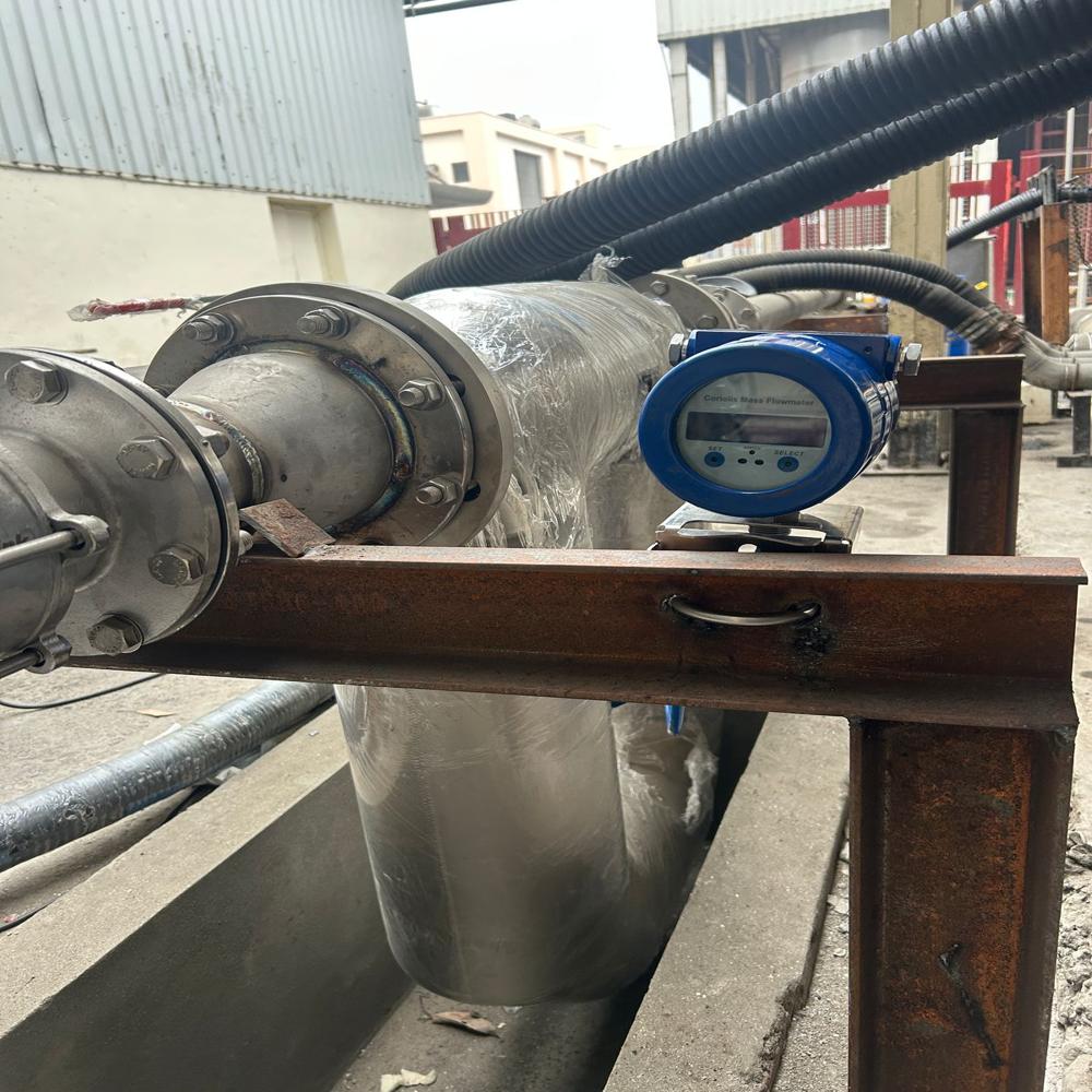 Coriollis mass flow meter