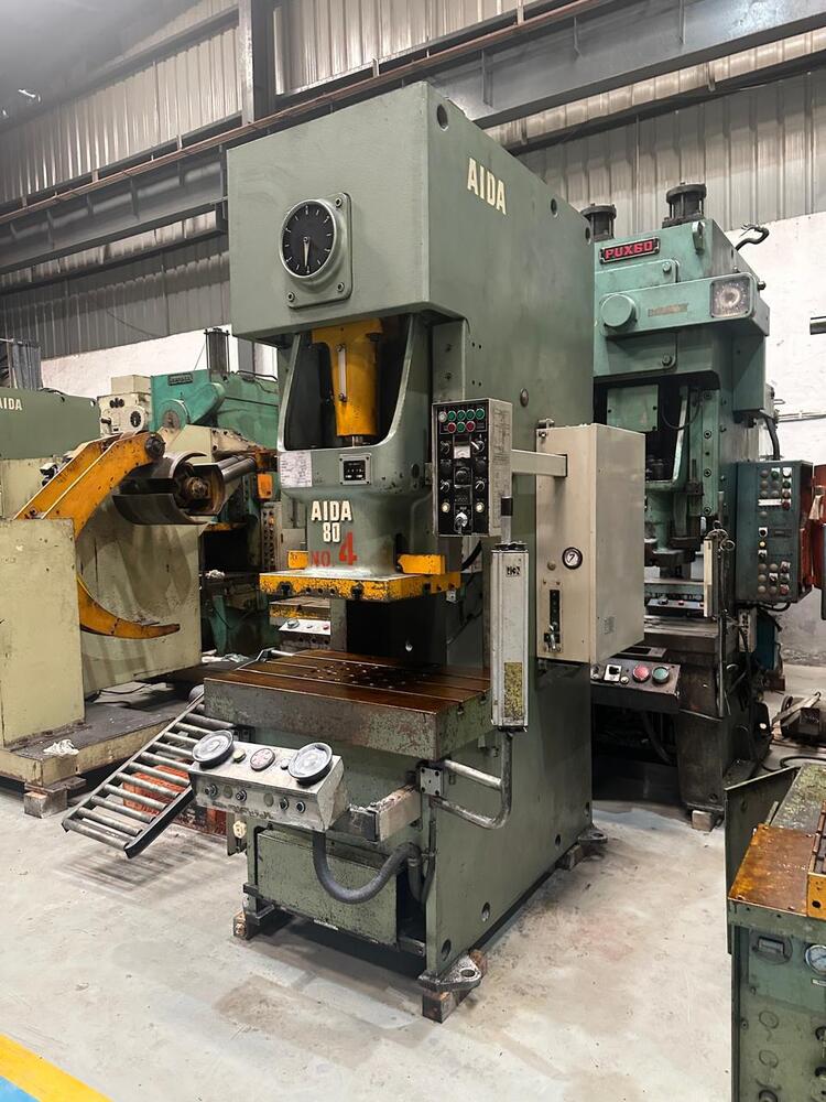 1761 Aida C Frame Single Crank Press - 80 Tons Capacity, 160mm Stroke, 320mm Die Height, 4075 Spm, 540x460mm Slide, 950x600mm Bolster, Includes Die Cushion