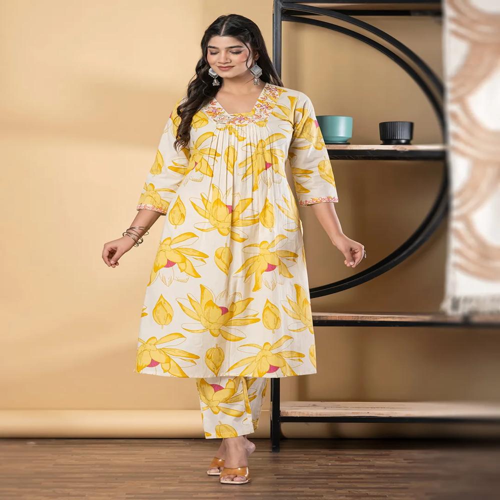 A Line Style Cotton Fabric Yellow Color Kurta And Bottom
