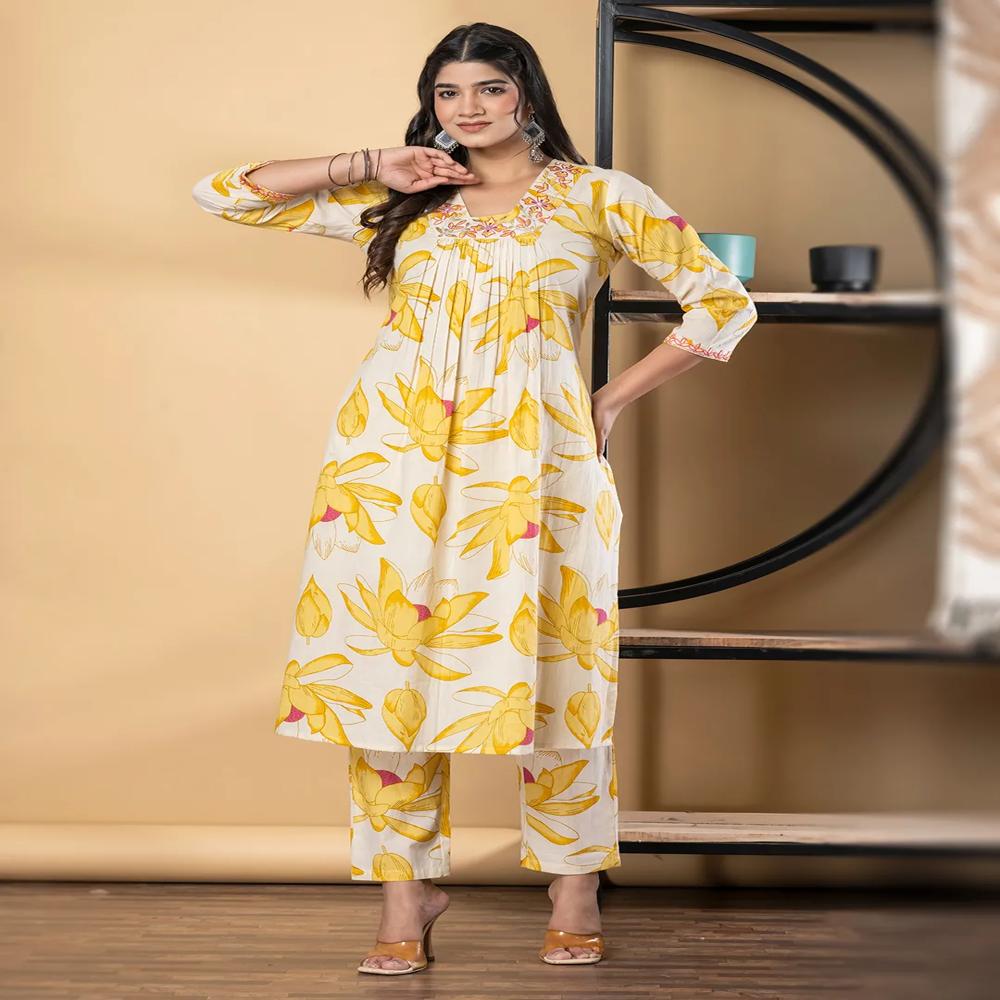A Line Style Cotton Fabric Yellow Color Kurta And Bottom