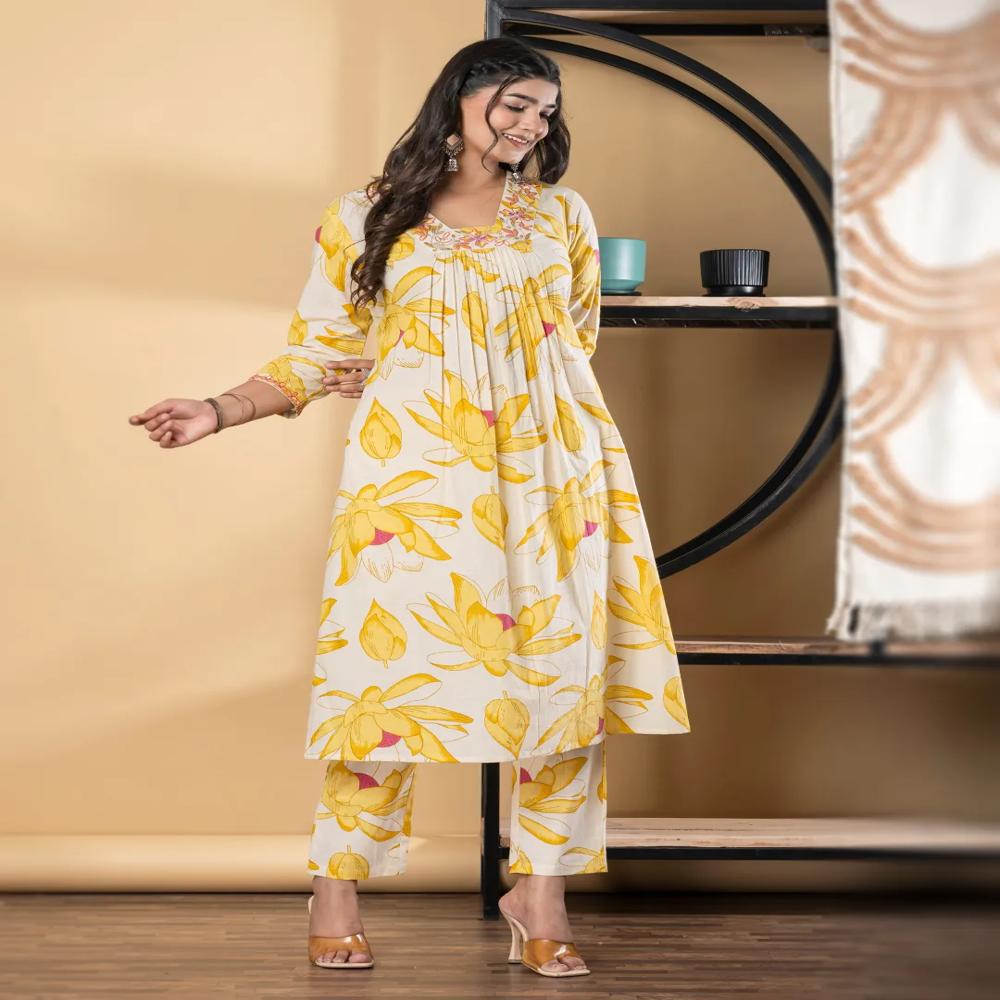 A Line Style Cotton Fabric Yellow Color Kurta And Bottom