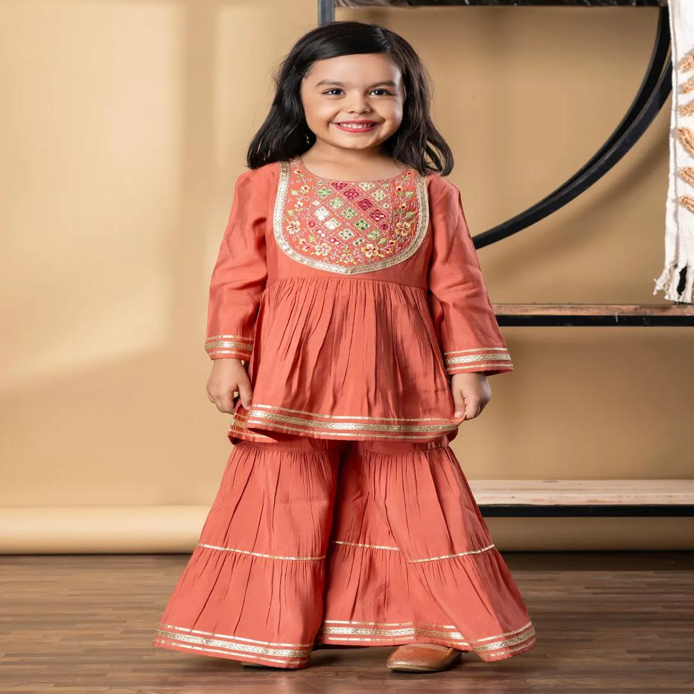 Peplum Style Roman Silk Fabric Peach Color Kurti With Sharara 