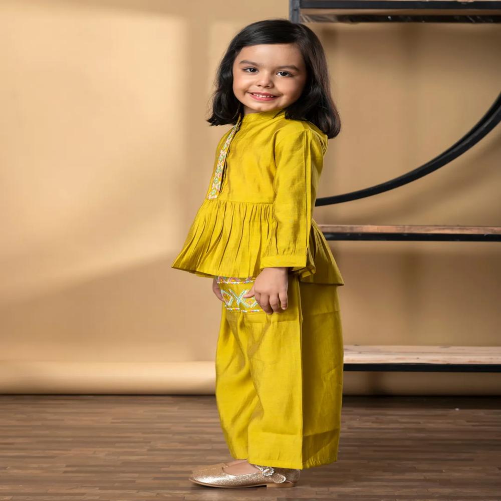 Peplum Style Roman Silk Fabric Gold Color Kurti With Palazzo