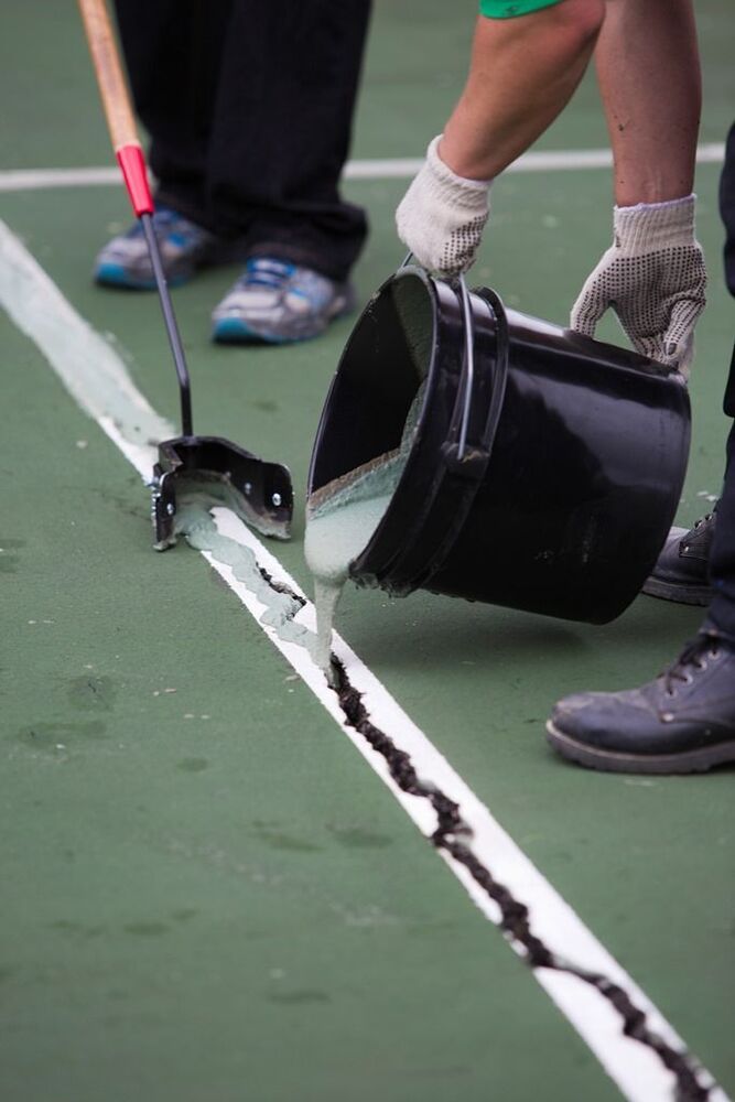 Tennis court resurfacing