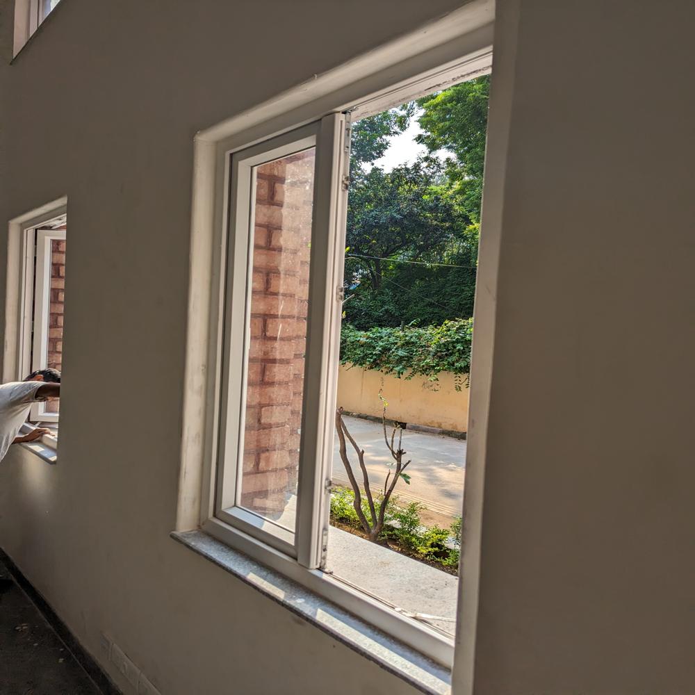 Hung Windows - Upvc Toughened Glass, 12mm Frame Thickness, White Powder Coated Finish | Industrial Application, Swing Opening Style, Rectangular Design
