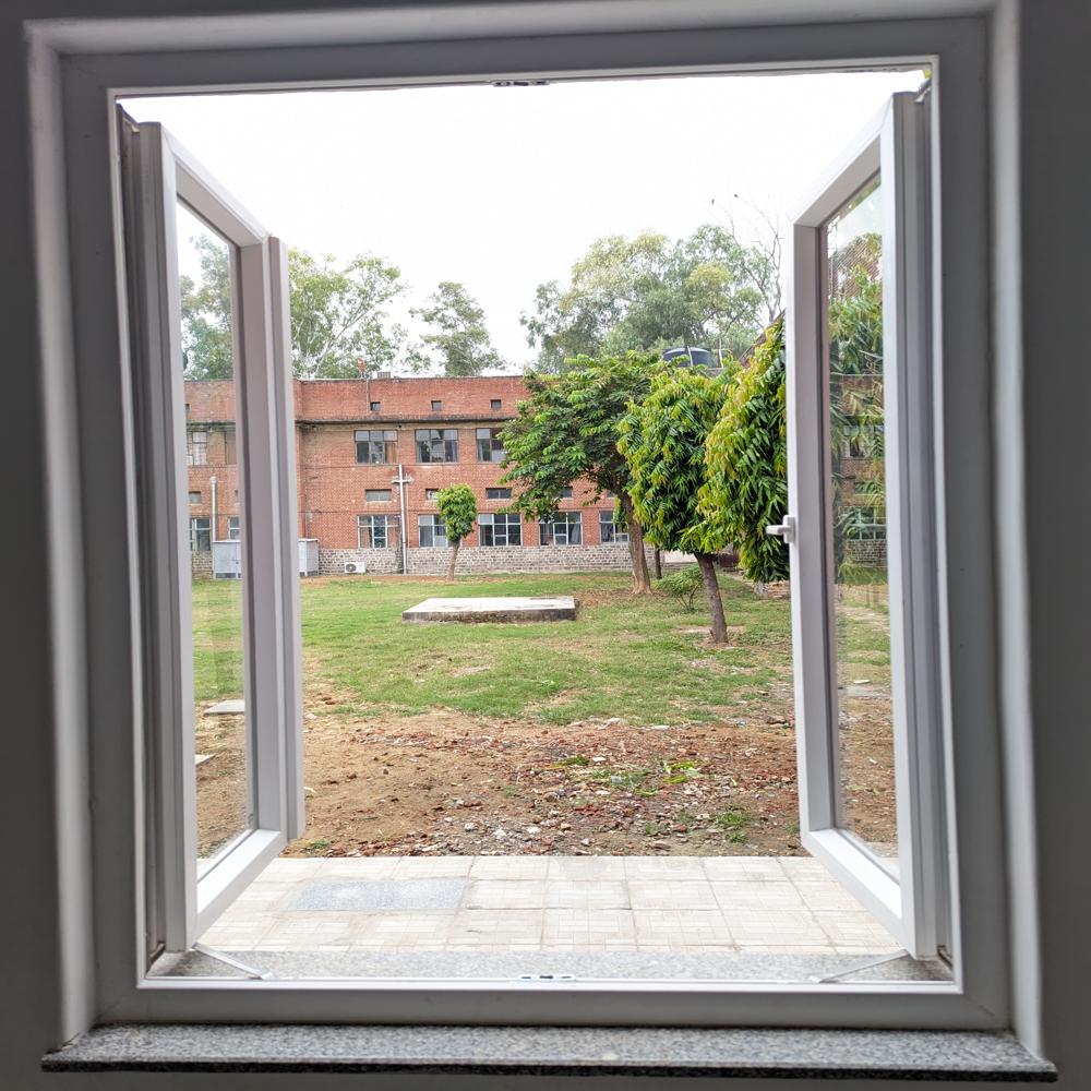 Hung Windows - Upvc Toughened Glass, 12mm Frame Thickness, White Powder Coated Finish | Industrial Application, Swing Opening Style, Rectangular Design