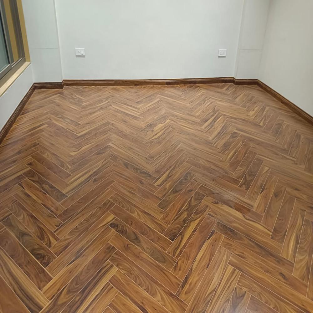 Herringbone Laminate Wooden Flooring - 6-10mm Thickness, Brown Color | Easy To Install, Waterproof, Polished Surface Design