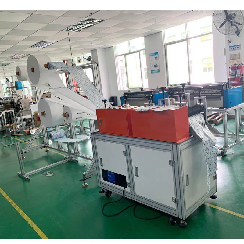 Three Phase Sanitary Pad Making Machine