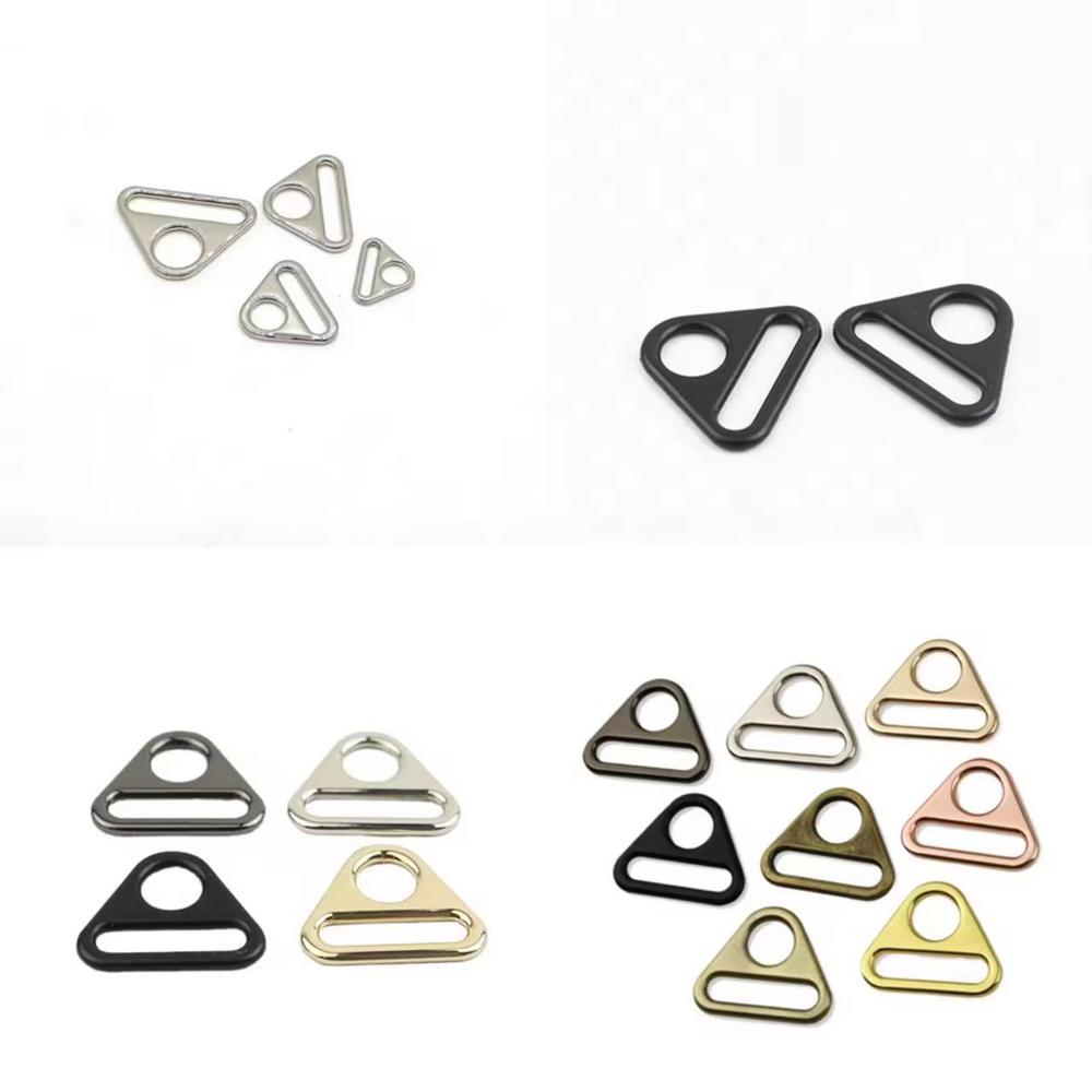 Hardware accessories for luggage and handbags, including zinc alloy round hole adjustment buckles, triangular webbing buckles, and chain link plates suitable for women's handbag components.
