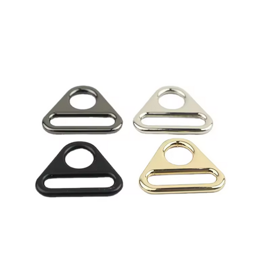 Hardware accessories for luggage and handbags, including zinc alloy round hole adjustment buckles, triangular webbing buckles, and chain link plates suitable for women's handbag components.