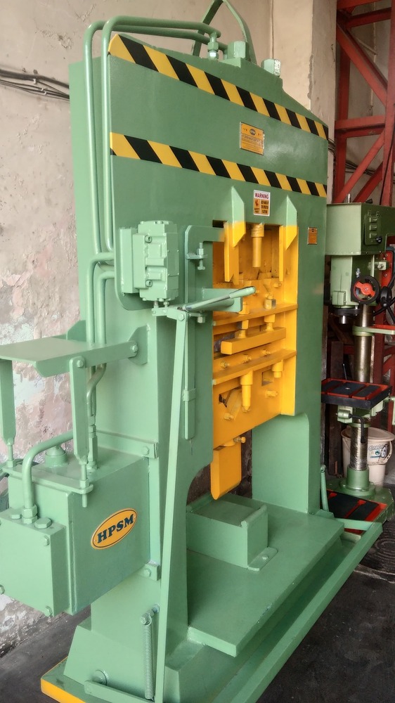 Red And White Iron Worker Machine