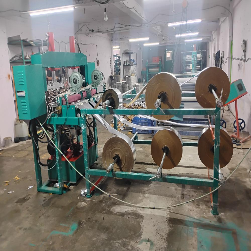 Hydraulic Automatic Dona Thali Making Machine - Capacity: 6000 Kg/hr