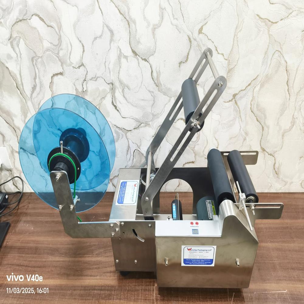 SEMI AUTOMATIC LABELLING MACHINE