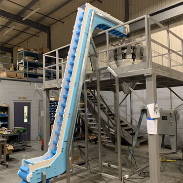 Z Elevator Vertical Conveyor - Features: Wear Resistance