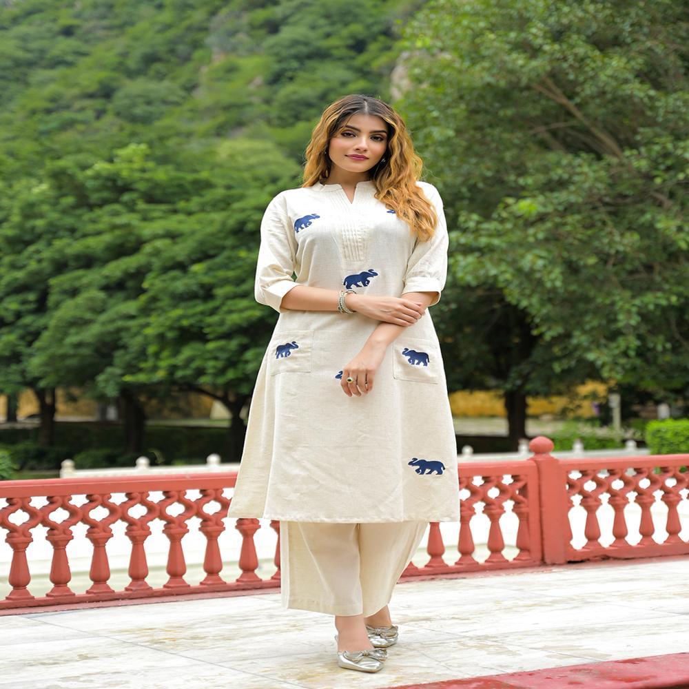 Divena Off White Embroidered Cotton A-line Kurta Pant Sets