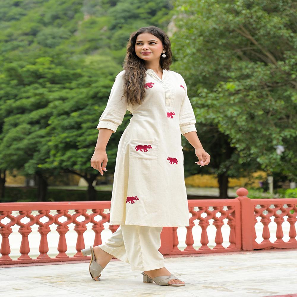Divena Off White Embroidered Cotton A-line Kurta Pant Sets