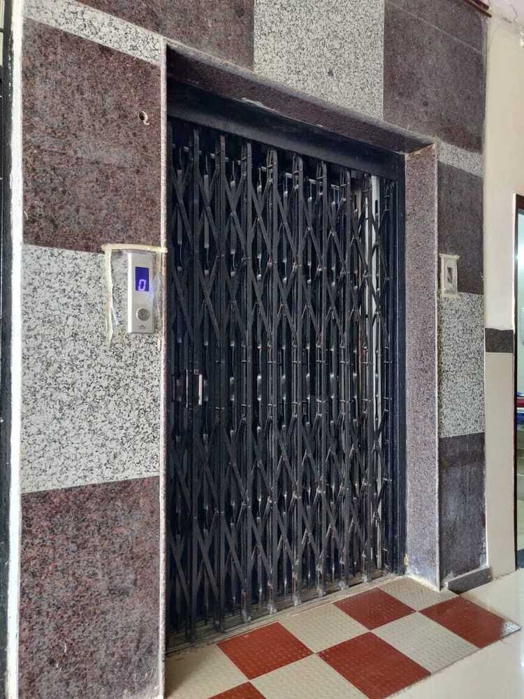 संकुचित होने योग्य गेट यात्री लिफ्ट