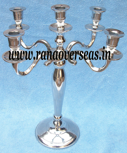 Silver Brass Candle Stand In Nickle Plated.