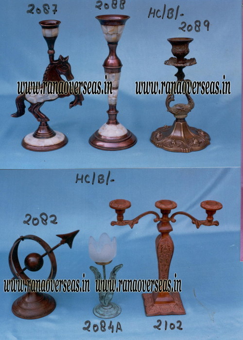 Brown Brass Candle Stands In Antique Finish.